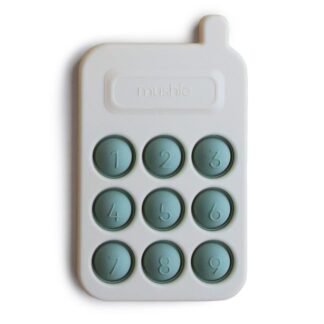 Zabawkowy telefon z zielonymi przyciskami, marki Mushie.